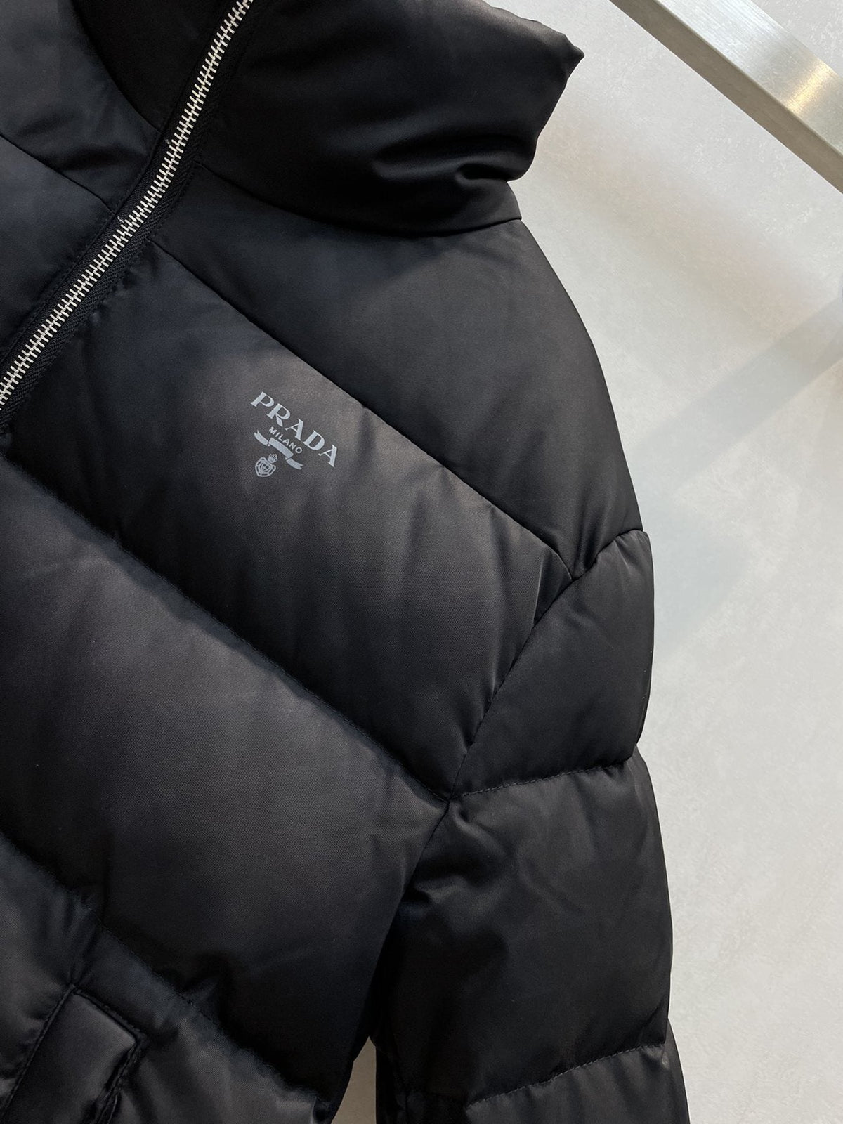 Prada Black Quilted Logo Puffer Jacket — detail