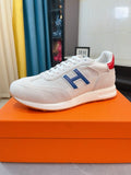 Hermès Blue H Overlay Sneakers — front