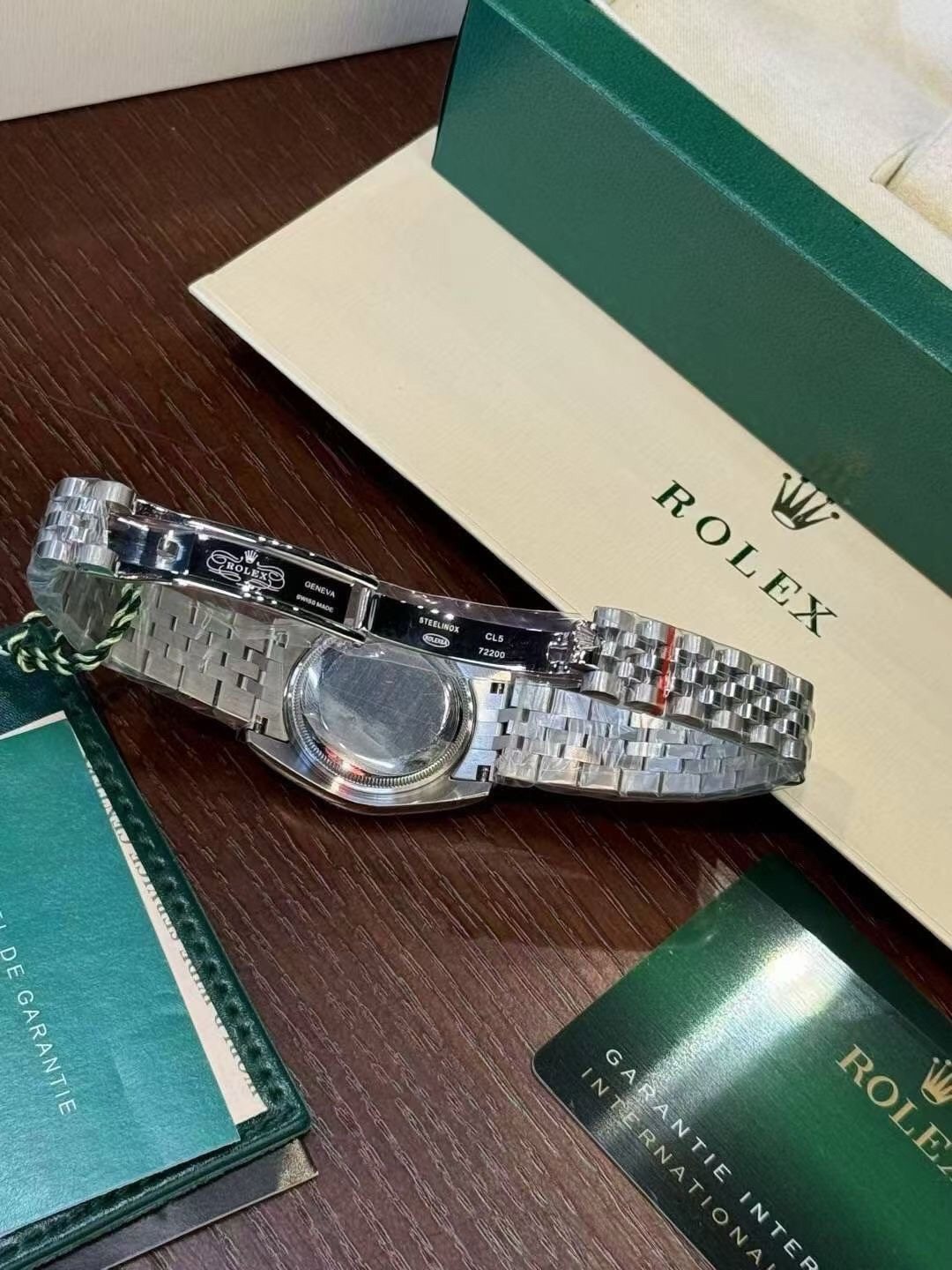 Rolex Pink Dial Metal Bracelet Watch — back
