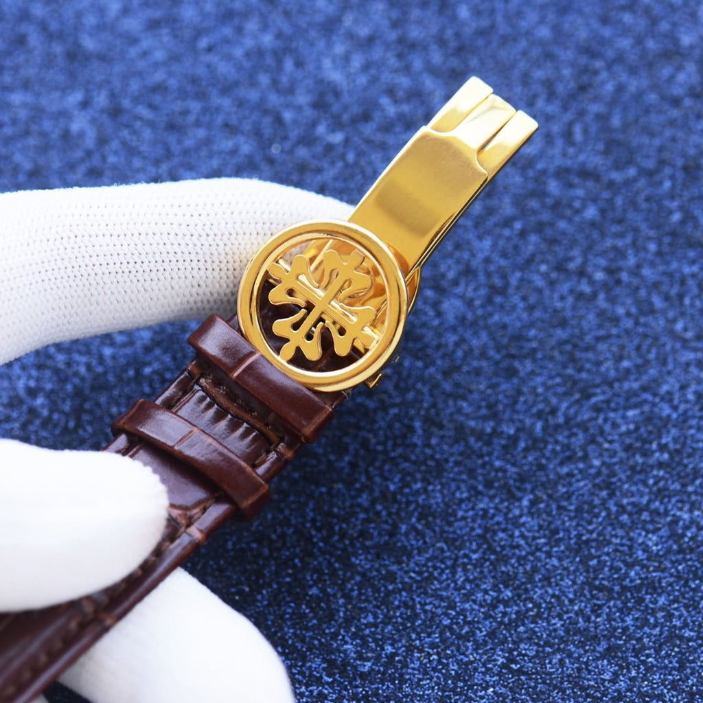 Patek Philippe Gold Brown White Dial Leather Strap Watch — detail