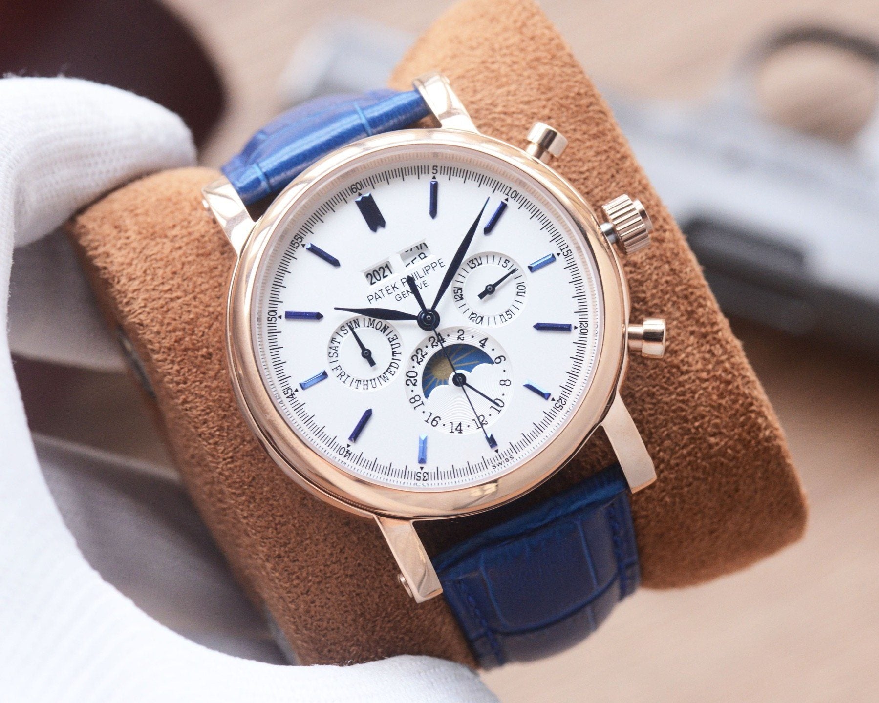 Patek Philippe Rose Gold Blue White Dial Strap Watch — hero
