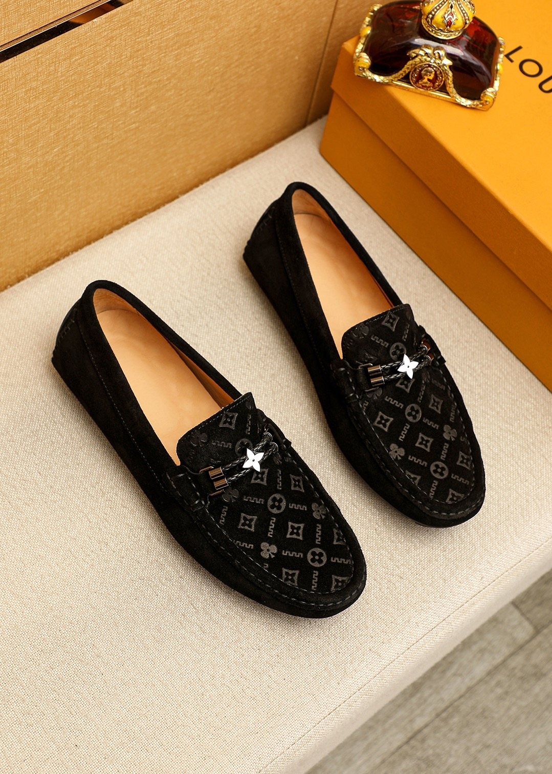 Louis Vuitton Embossed Metal-Detail Loafers — front
