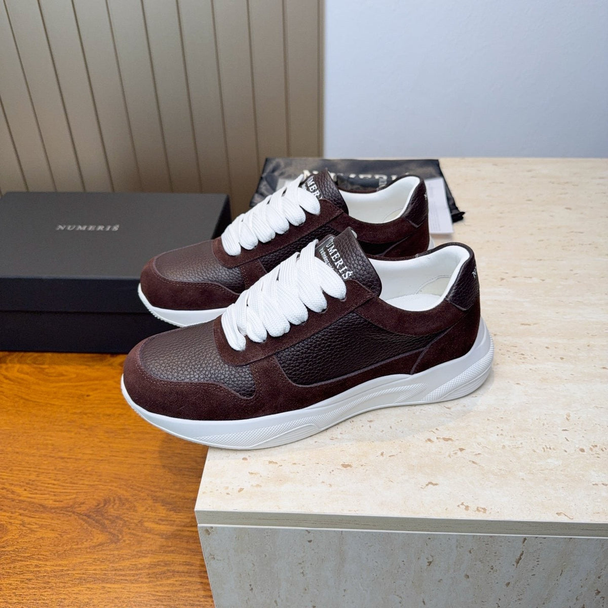 Numeris Paneled Low-Top Sneakers — front