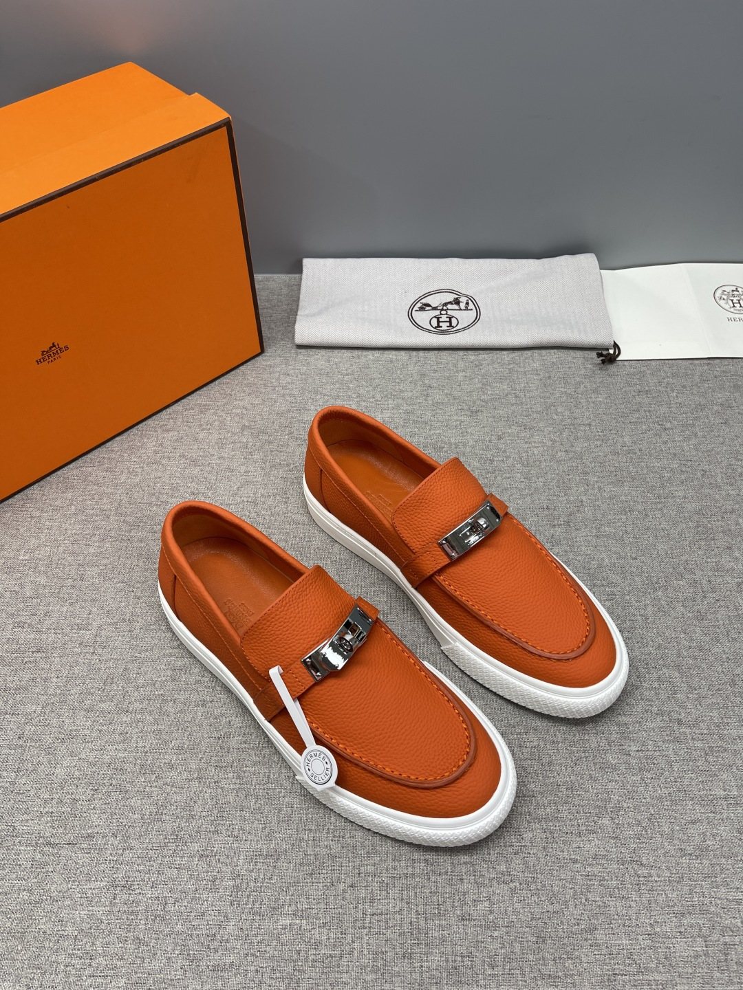 Hermès Textured Bar Loafers — front
