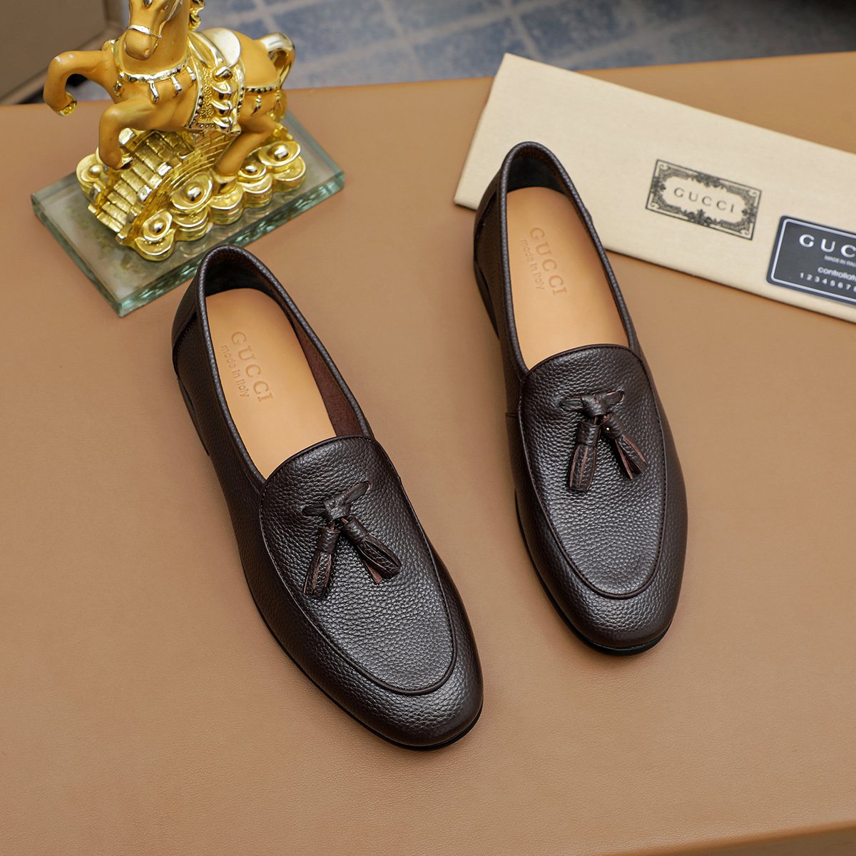 Gucci Textured Tassel Loafers — model
