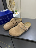 Birkenstock Closed-Toe Buckle Clogs — hero