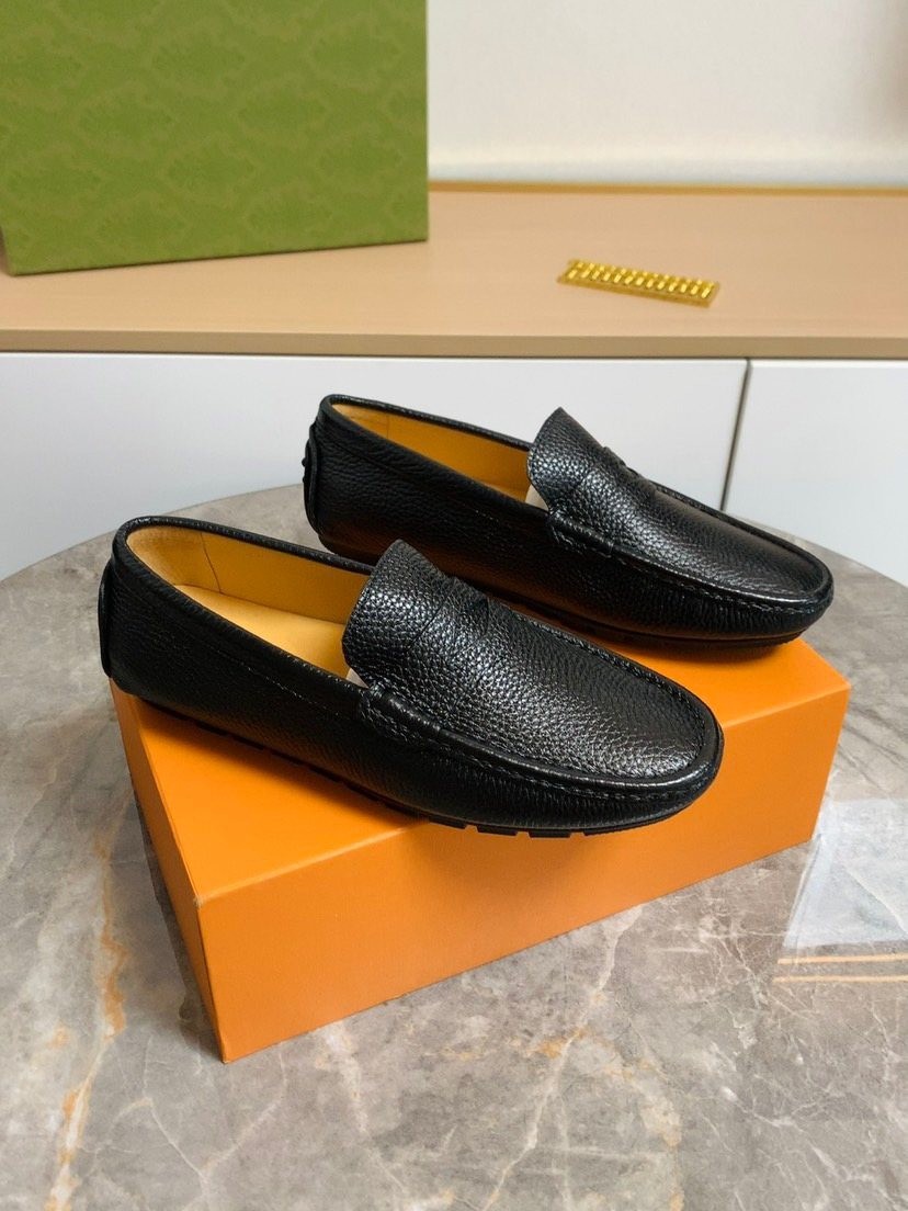 Louis Vuitton Textured Moc-Toe Loafers — front