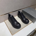 Black and Off-White Low-Top Sneakers — front