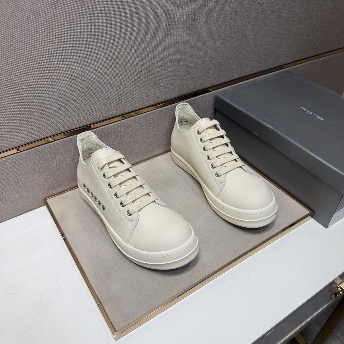 Black and Off-White Low-Top Sneakers — front