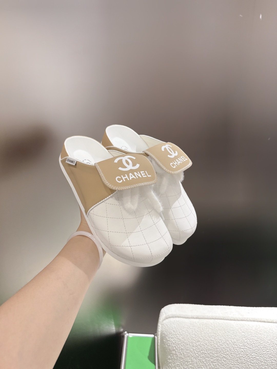 Chanel Quilted Closed-Toe Slip-On Shoes — front