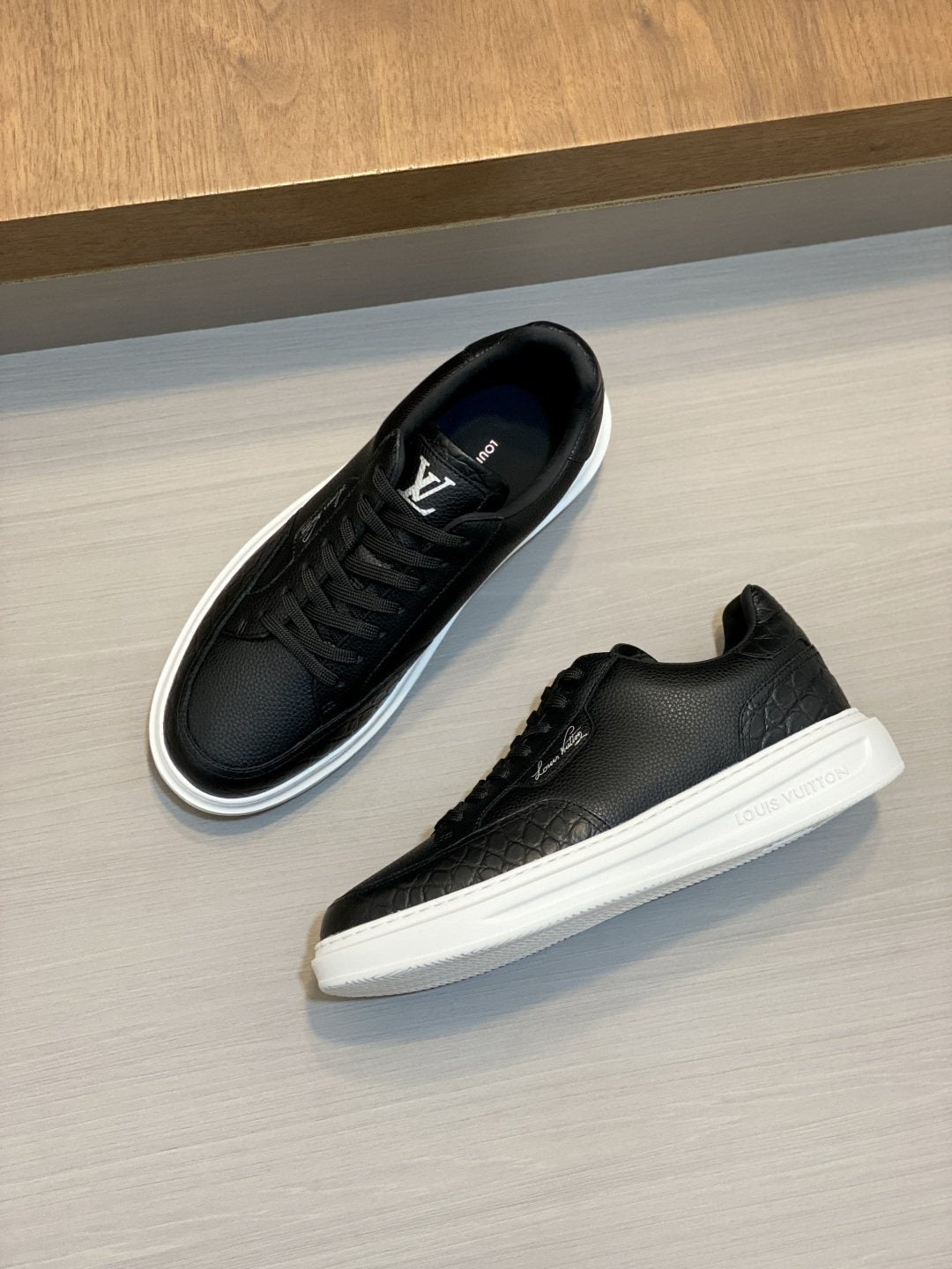 Louis Vuitton Textured Low-Top Sneakers — hero