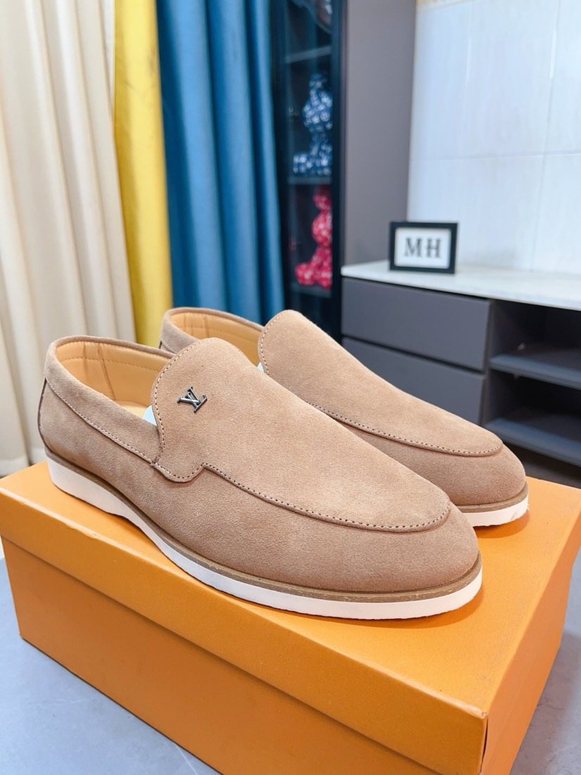 Louis Vuitton Textured Slip-On Loafers — front