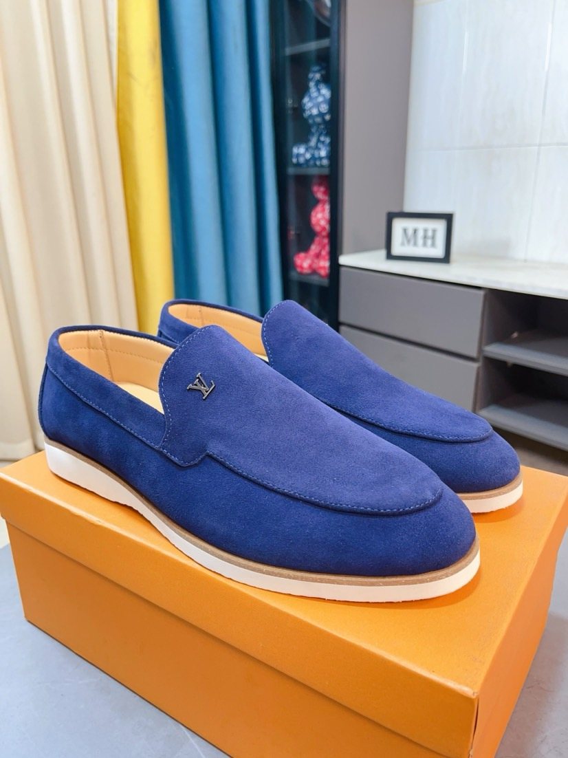 Louis Vuitton Textured Slip-On Loafers — front