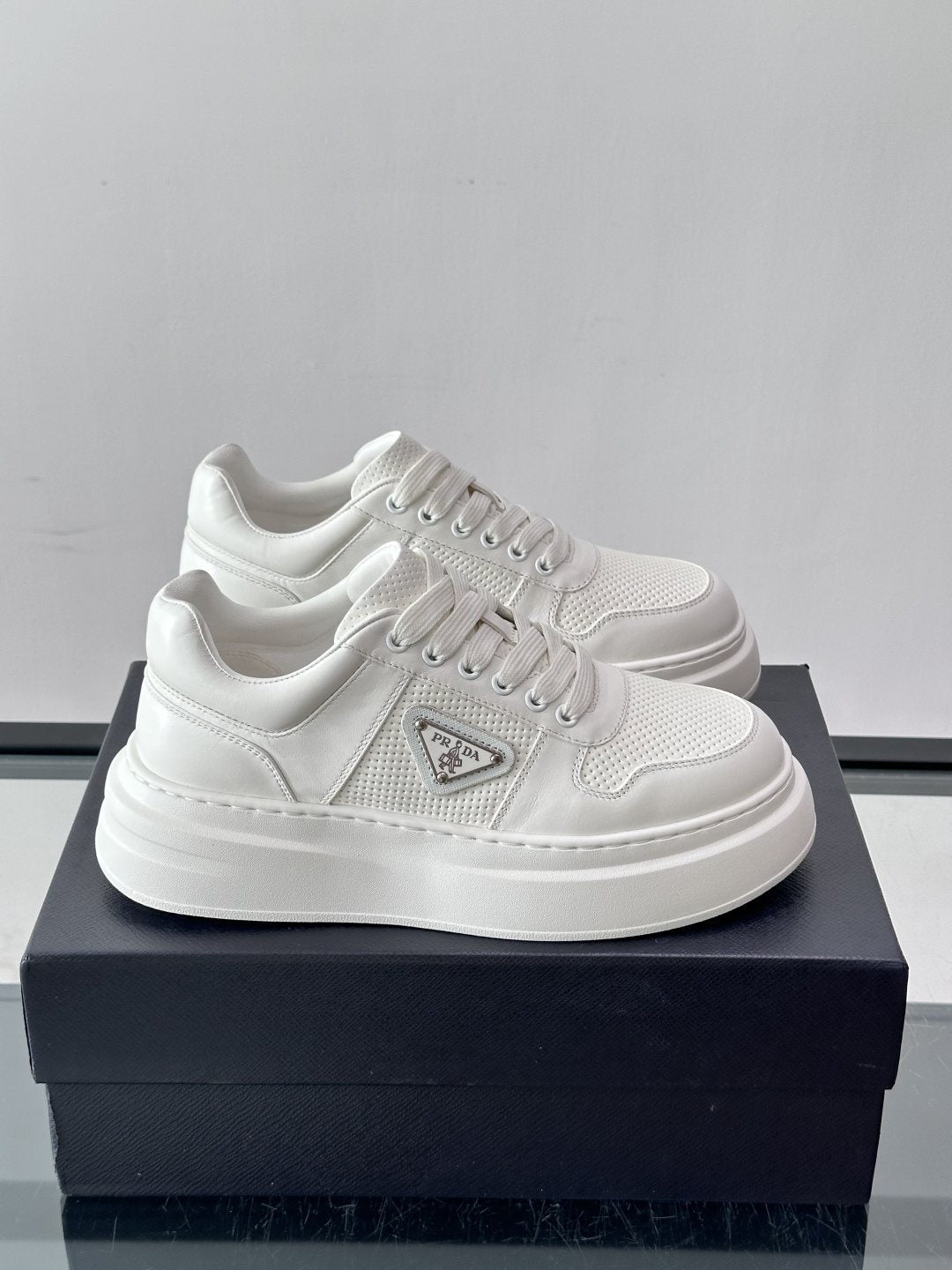Prada Triangle Detail Low-Top Sneakers — front
