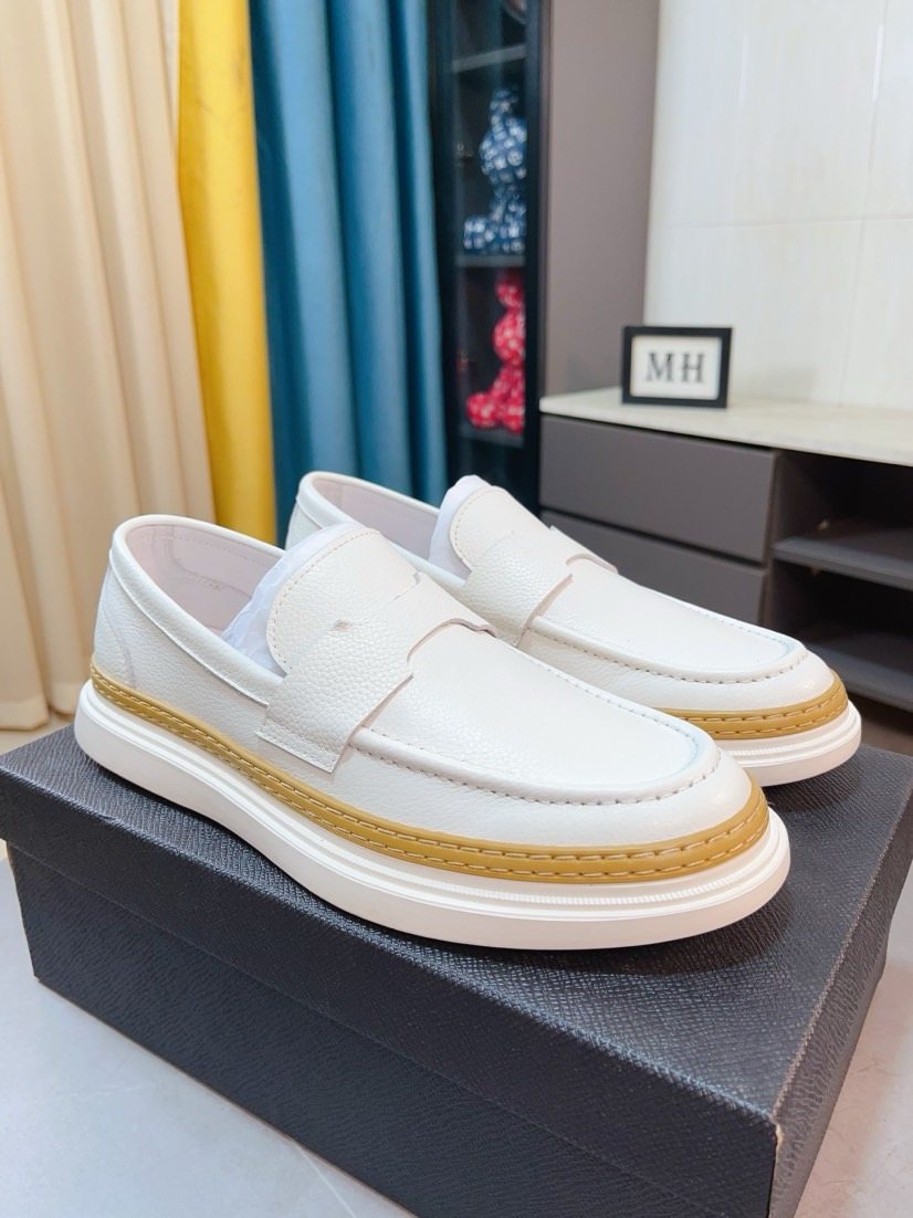 Prada Textured Slip-On Shoes — front