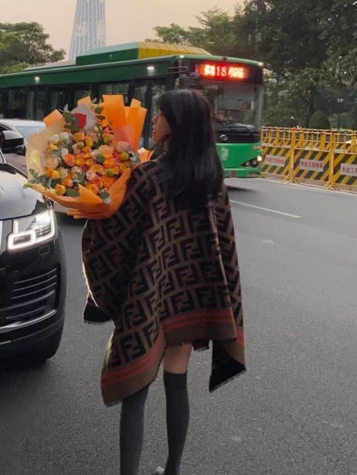 Fendi Fringed Geometric Shawl — model