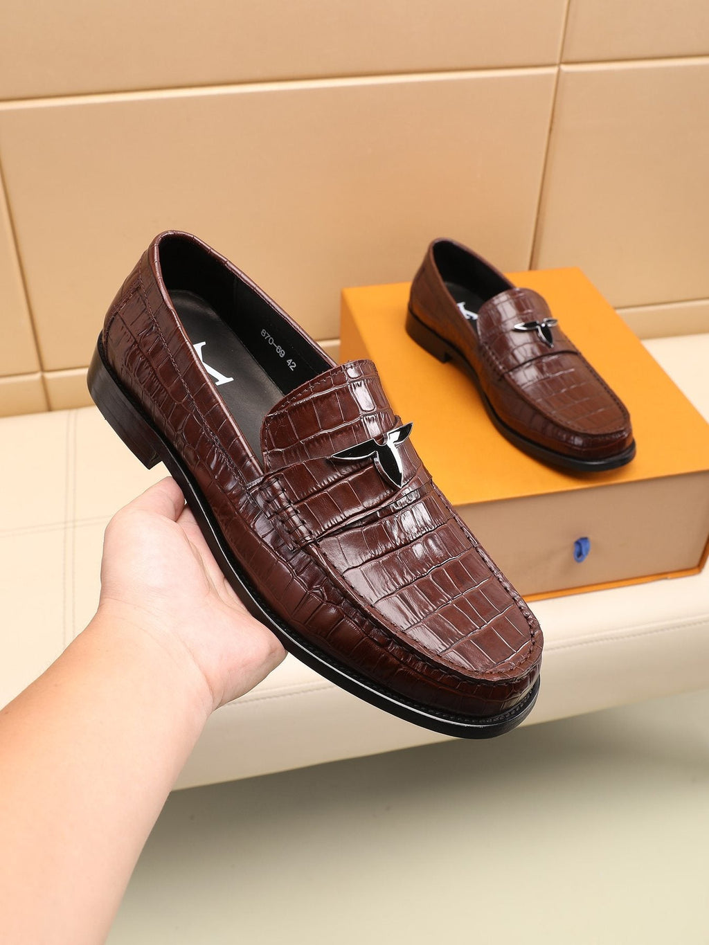 Louis Vuitton Embossed Strap Loafers — model