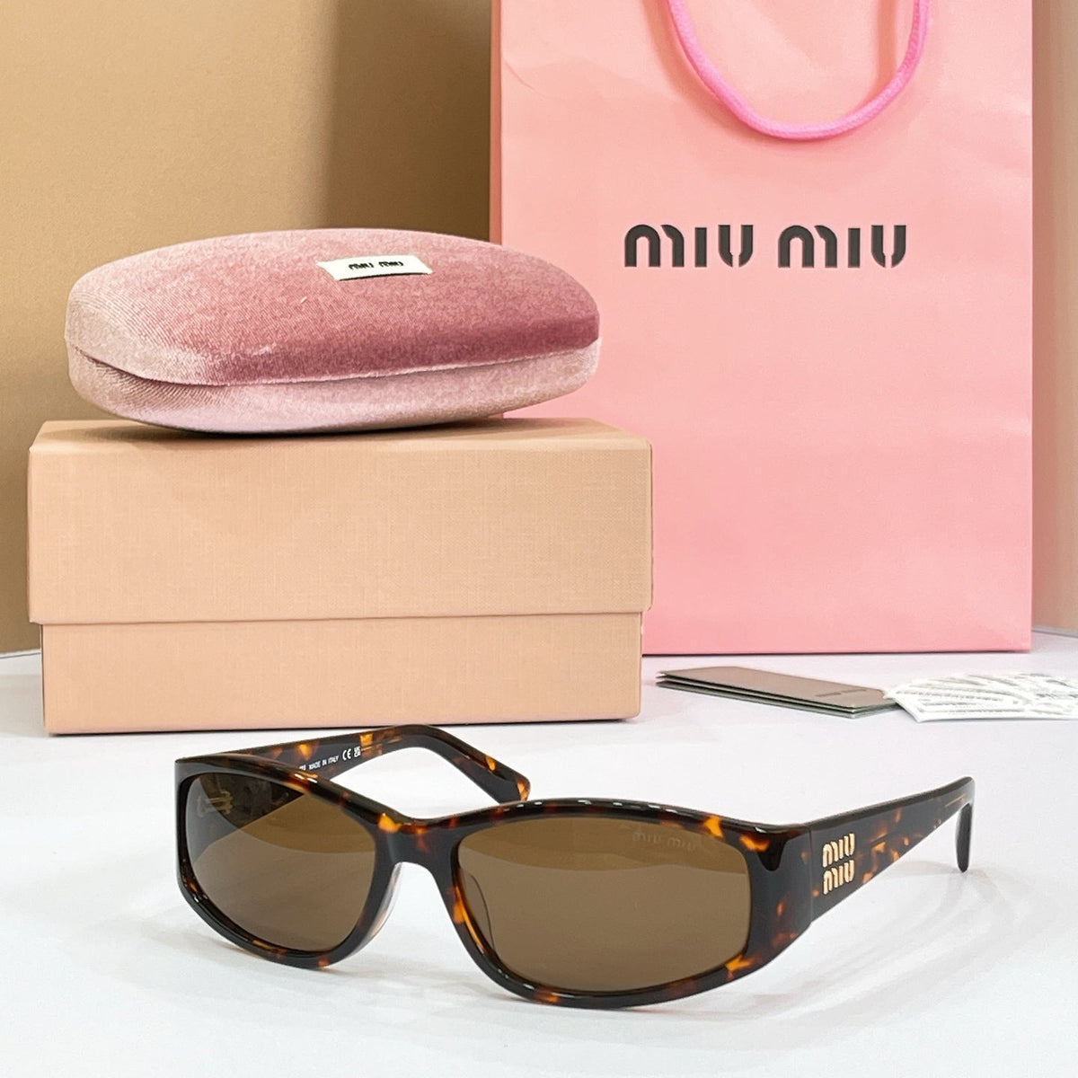 Miu Miu Sunglasses – MU C06SU